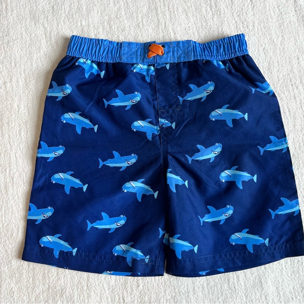 Freestyle Revolution blue shark swim trunks Size 4. NWOT